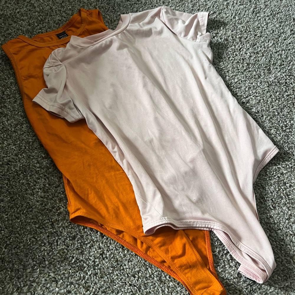 Source Unknown Pink and Orange Bodysuits